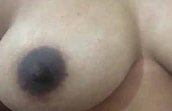 Sexy desi girl Swan showing hot boobs and playing nipples